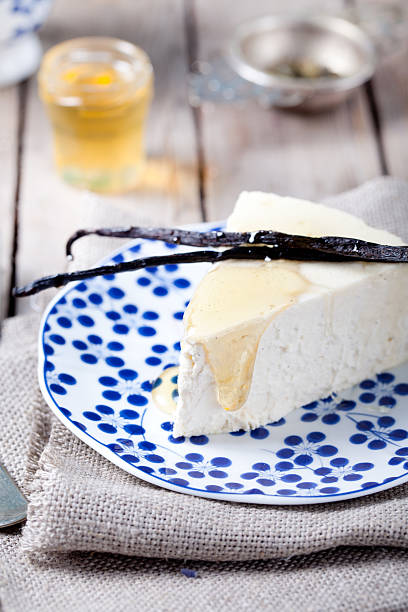 istock Vanilla and honey cheesecake on a blue plate 491825476