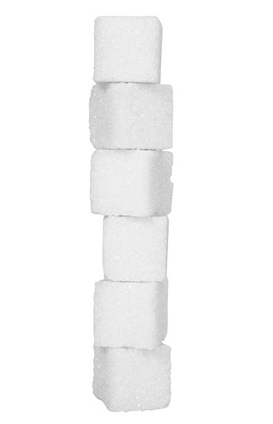 Stack of sugar cubes Stack of sugar cubes sugar cube stock pictures, royalty-free photos & images