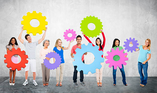 istock DIversity People Holding Cog Collaboration Cheerful Concept 491828584