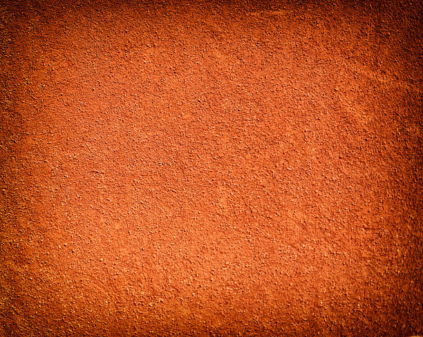 Tennis court background with red clay sand stock photo