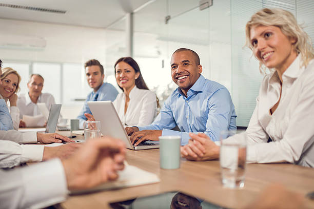 istock Smiling business people discussing on a meeting in office. 491836694