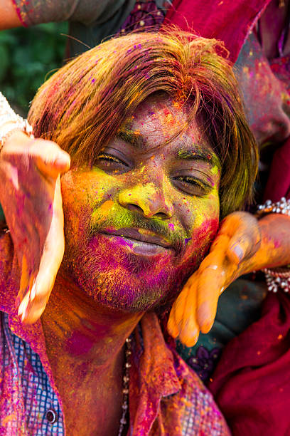 istock Young Indian man celebrating holi. 491836813