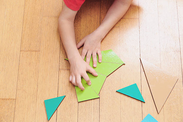 istock little boy playing with puzzle, early education 491837702