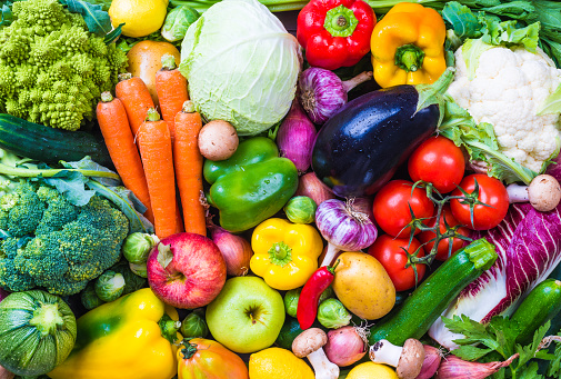 Overhead view of fresh healthy organic vegetables background. High resolution 42Mp studio digital capture taken with SONY A7rII and Zeiss Batis 40mm F2.0 CF lens