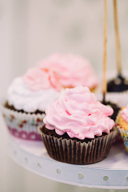 istock Dessert Sweet Cupcakes, Candy, confection On Table. Sweets. Cand 491838806