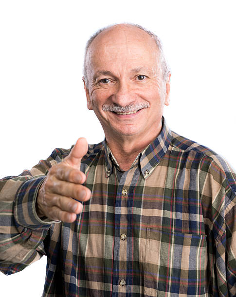 istock Senior man reaching out hand for handshaking 491839086