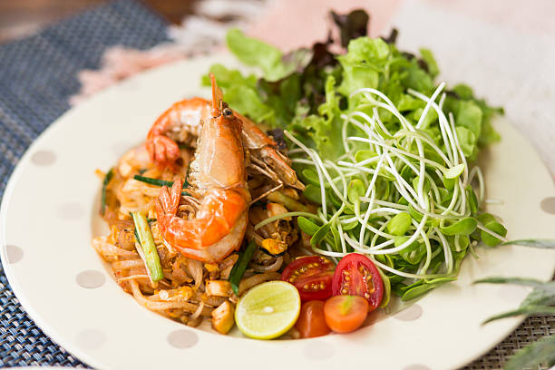 Thailand fried noodles with shrimps, we called it PAD-THAI, very famous Thai street food.