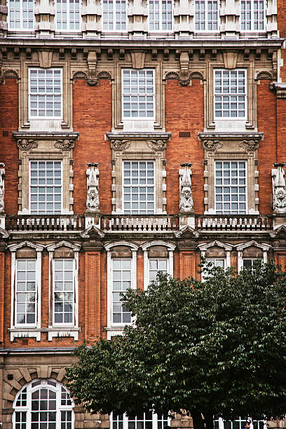 istock Facade of red brick building in London 491841198