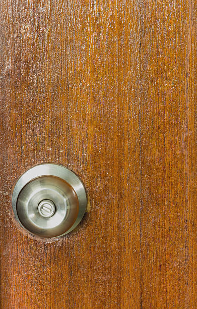 istock door knobs on a wooden door 491841730