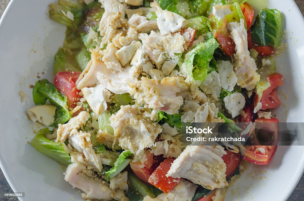 Chicken salad top view Chicken salad with tomatoes ,  bread and mix vegetables Appetizer Stock Photo