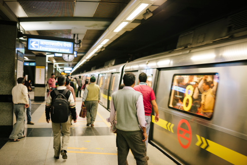 People on a subway station platform, New Delhi