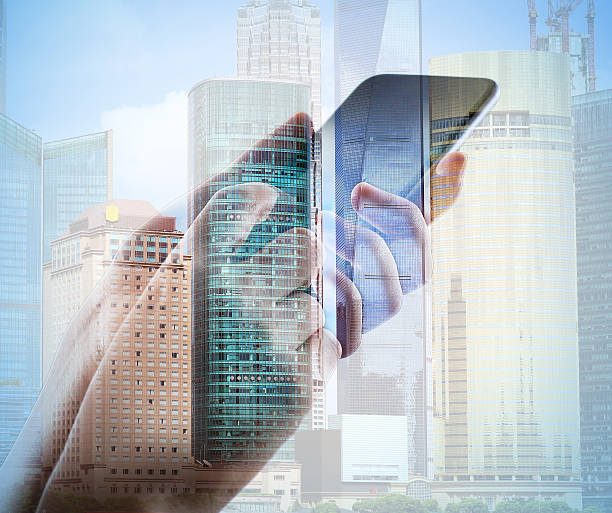 istock Double exposure of cityscape and smart phone 491843270