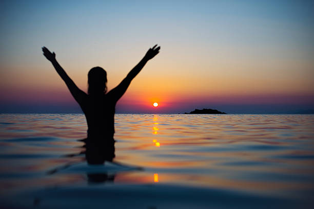 istock Girl enjoying sunset 491851164