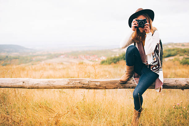 istock Hiker girl with a camera 491851212