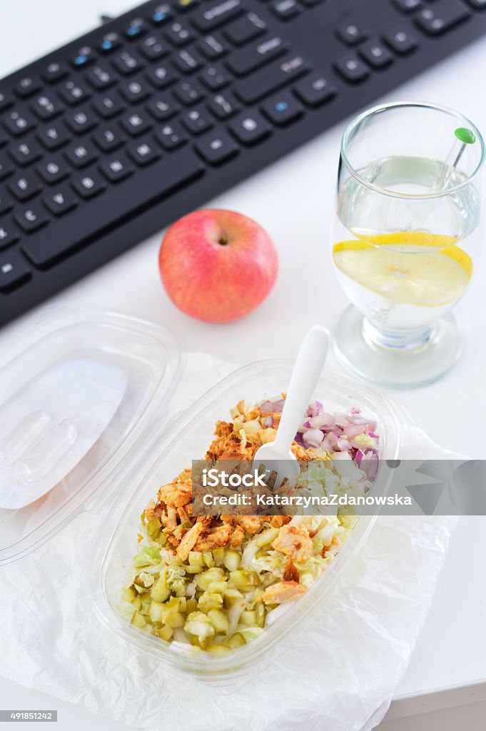 Healthy eating for lunch to work. Food in the office Healthy eating for lunch to work. Food in the office. Chicken salad. 2015 Stock Photo