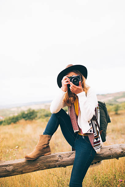 istock Hiker girl with a camera 491851278