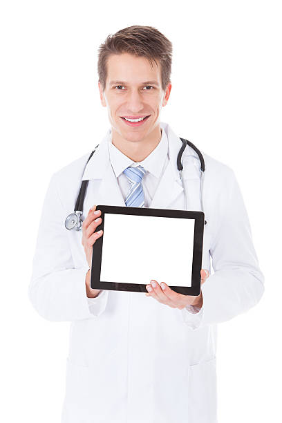 istock Male Doctor Holding Digital Tablet 491851686