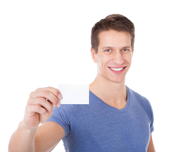 istock Portrait Of Young Man Showing Visiting Card 491851720