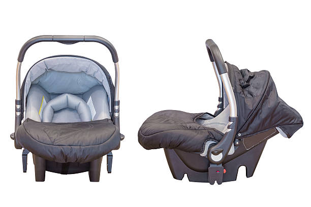 Baby car seat Baby car seat isolated on white background empty baby seat stock pictures, royalty-free photos & images