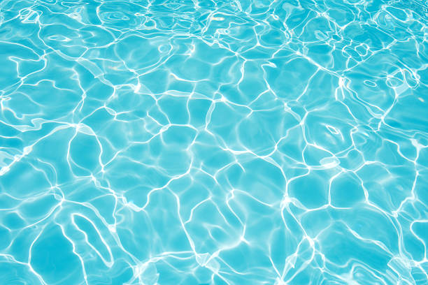 istock Clean and bright water surface in swimming pool 491854428