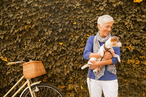 istock Woman with dog 491855554