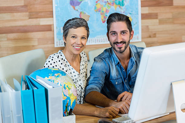 istock Smiling business people smiling at camera 491855816