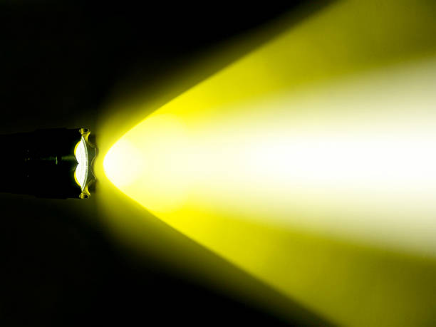 istock yellow light of the torch in the dark 491856018