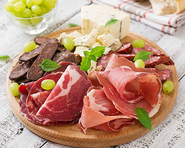istock Antipasto catering platter with bacon, jerky, sausage, blue cheese 491856752