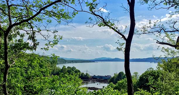 Vista of The Hudson River A beautiful vista looking down the Hudson River valley from elevation. Shot in New Hamburgh, New York.  hudson valley stock pictures, royalty-free photos & images