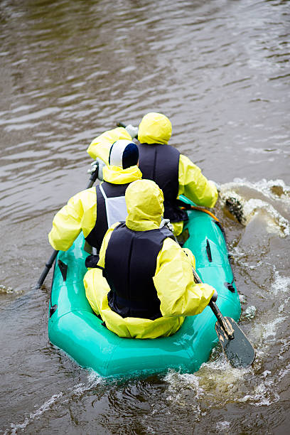 istock People in overcrowded rubber boat 491870495