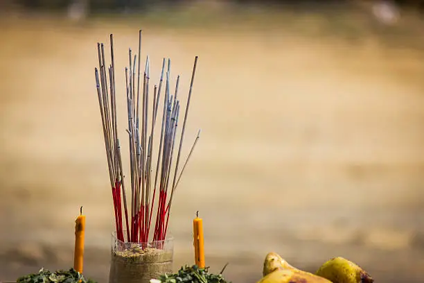 candle and incense sticks.