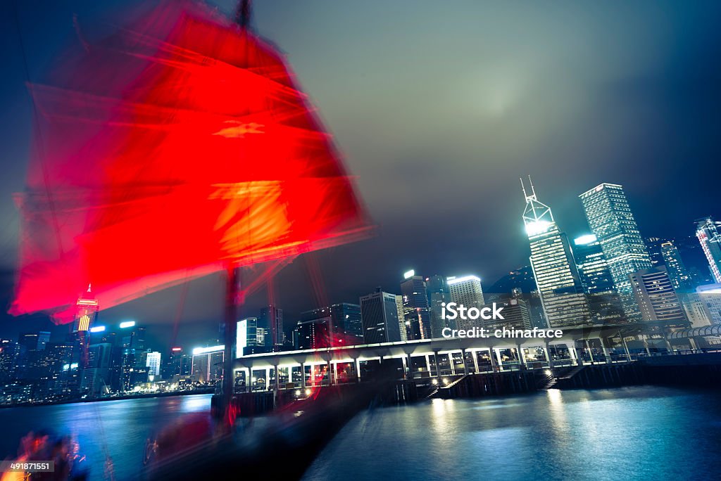 Junkboat  of hong kong Traditional Chinese Junkboat sailing across Victoria Harbour at night,  Hong Kong Asia Stock Photo