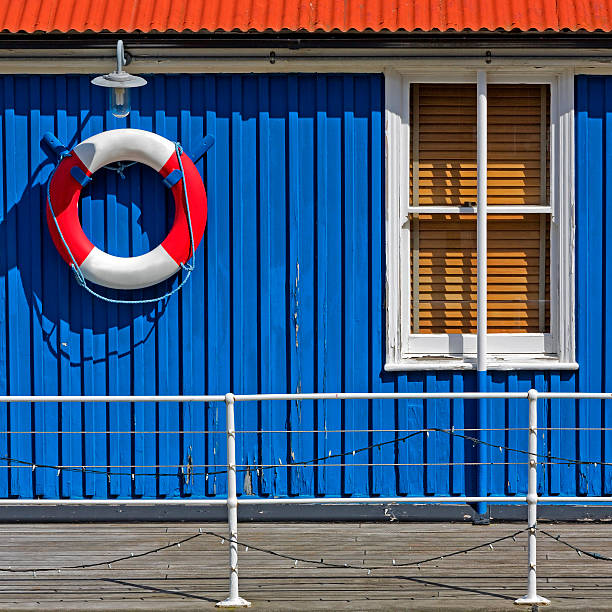 Facade detail of a waterhouse/boathouse on Thames in London.