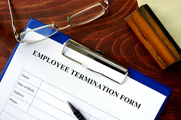 istock Employee termination form on a wooden table. 491872942