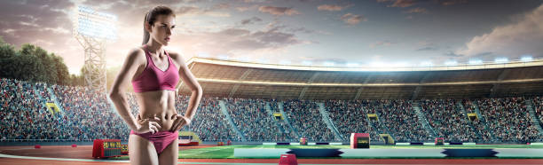 istock Female athlete standing on a running track 491873282