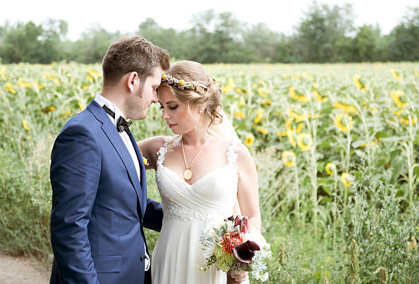 istock bride and groom in the nature on wedding day 491873476