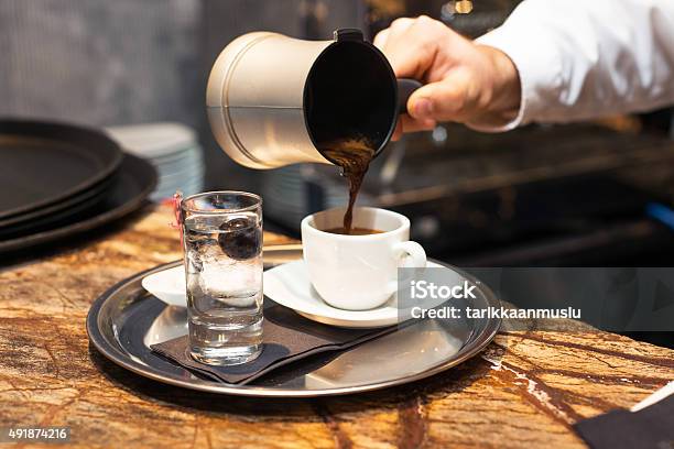 Closeup Of Espresso Pouring From Coffee Machine Stock Photo - Download Image Now - 2015, Barista, Brown