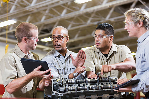 istock Vocational class, learning to repair gasoline engine 491874592