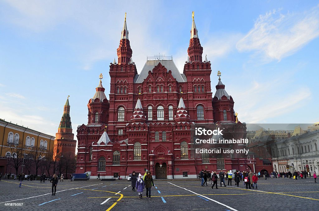 Russia Scene: People walking on Red square in Mosccow Moscow, Russia - December, 25, 2013, Russia Scene: People walking in front of historical Museum on Red square Capital Cities Stock Photo