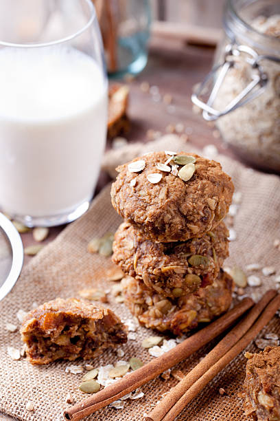 istock Oat and peanut butter cookies with glass of milk 491875708