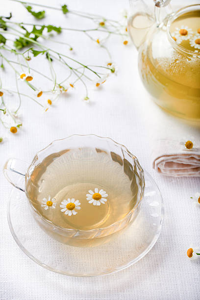 Camomile hebal tea in a white cup with
