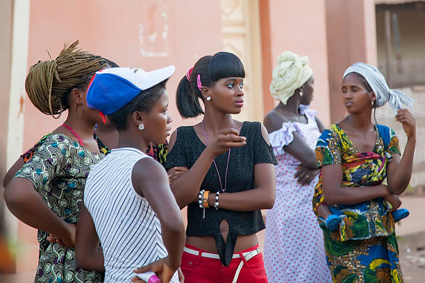 Gabu, Guinea-Bissau - April 9, 2014: Unidentified stylish African girls at a public gathering