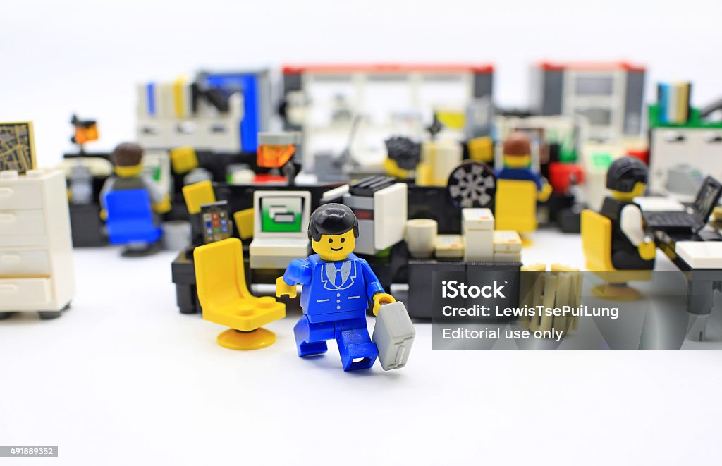 Lego office Hong Kong, Сhina - March 25, 2015:  Studio shot of Lego people in office, combine from different set. Legos are a popular line of plastic construction toys manufactured by The Lego Group in Denmark Office Stock Photo