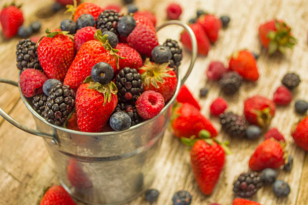 istock Pale of Strawberries, Blueberries, Raspberries, Blackberries 491891687