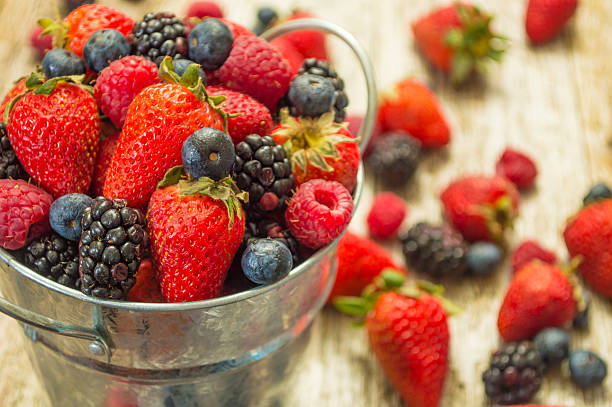 istock bucket full of berries 491891693