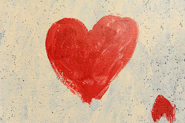 istock Heart painted on grunge wall 491891893