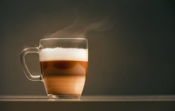 aromatic coffee cup of coffee on dark background cafe macchiato stock pictures, royalty-free photos & images
