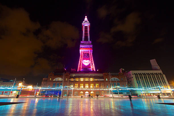 Blackpool Tower and The Golden Mile Illuminations at night The Famous Blackpool Tower and lights along the stretch of promenade known as the Golden Mile in Blackpool, Lancashire at night, photographed on a long exposure with light streaks during the yearly 'illuminations' spectacle. Blackpool Tower stock pictures, royalty-free photos & images