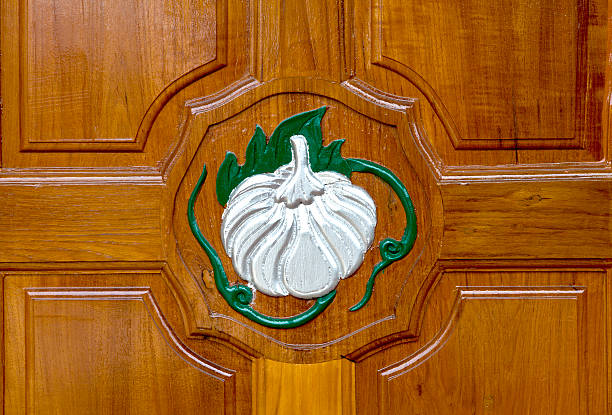 silver pumpkin carved on lacquer wooden door