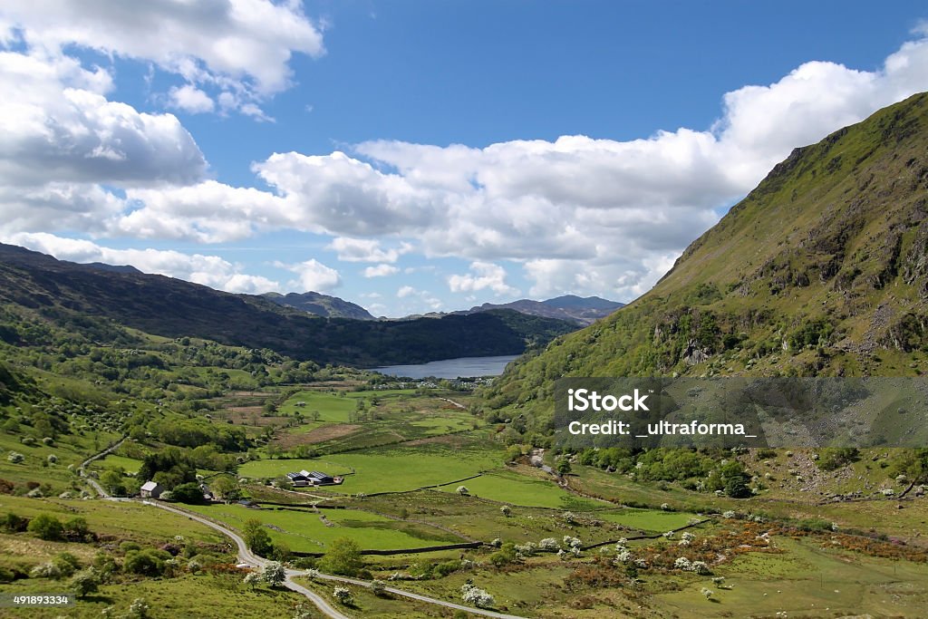 The Nant Gwynant Valley in Snowdonia, Wales View of the Nant Gwynant Valley and Llyn Gwynant in Snowdonia, Wales Valley Stock Photo